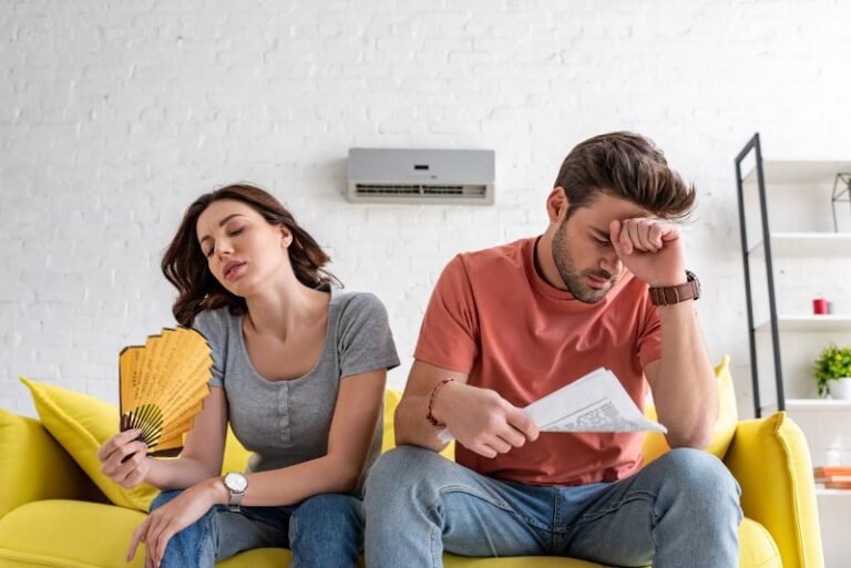 couple needs air conditioner repair
