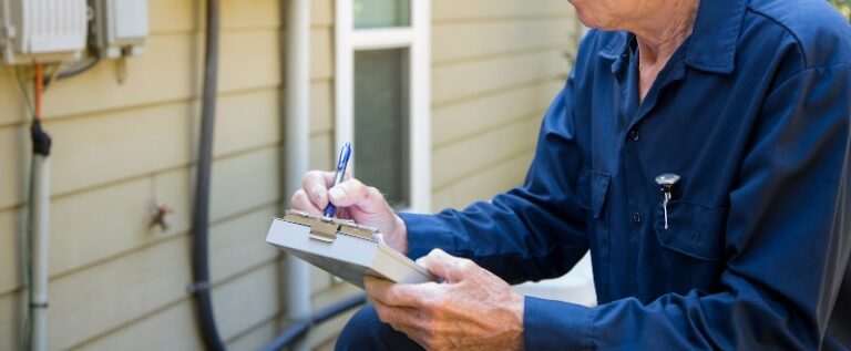 technician checking whole-home generator